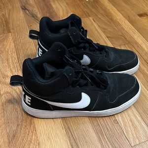 Classic high top black Nikes